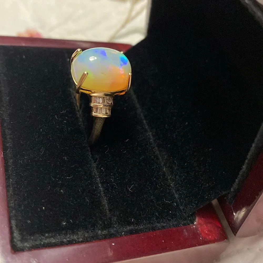 AAA Ethiopian Welo 7.56 cwt Opal and G-H SI Diamond Ring in 10 k gold size 7